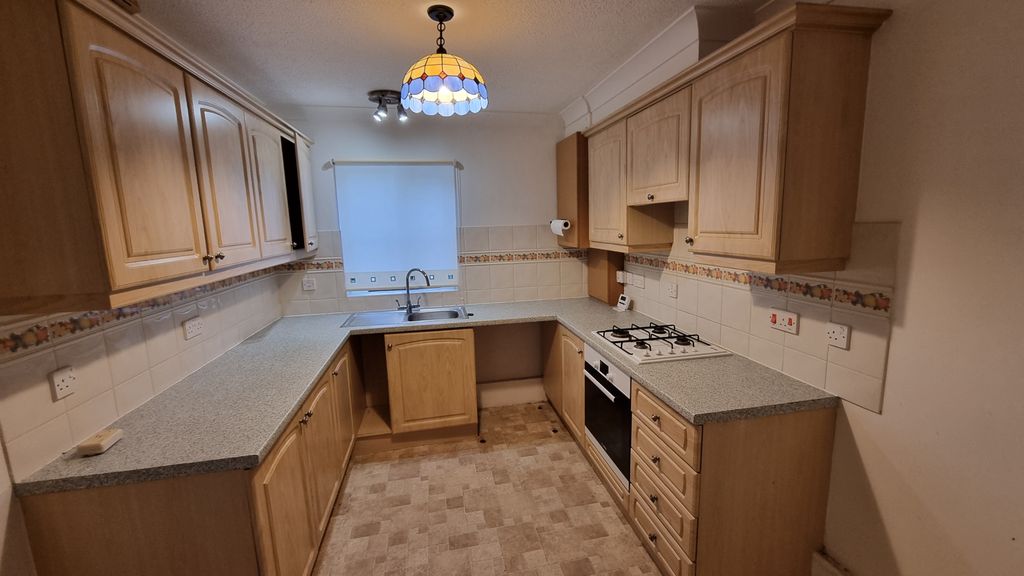 Property photo 3 of 8 Kitchen