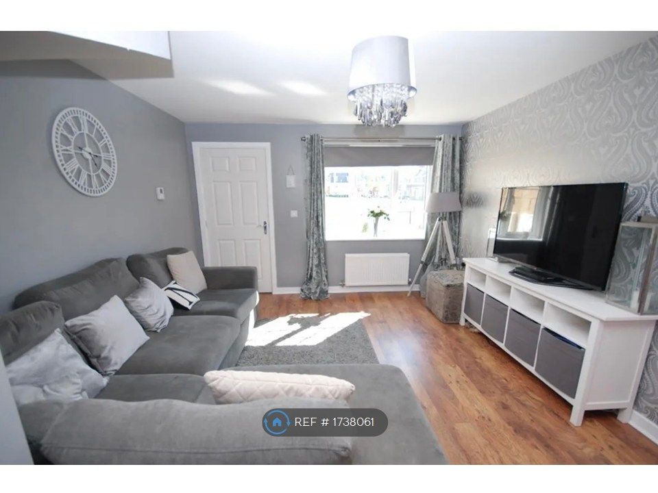 Property photo 2 of 12 Living Area