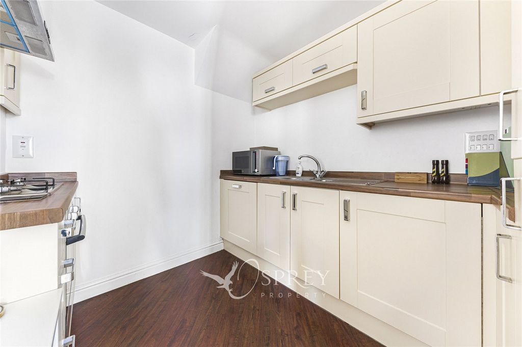 Property photo 3 of 12 Kitchen