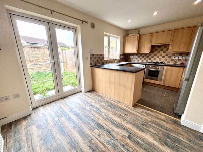 Property photo 2 of 11 Kitchen Dining Room