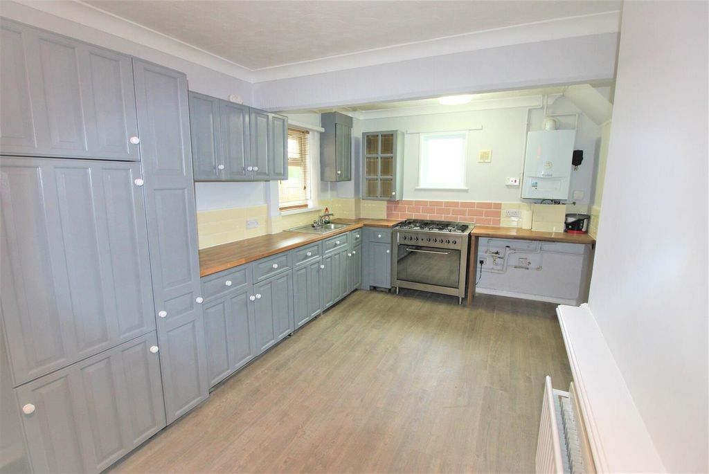 Property photo 2 of 9 Spacious Modern Kitchen With Ample Storage Space...