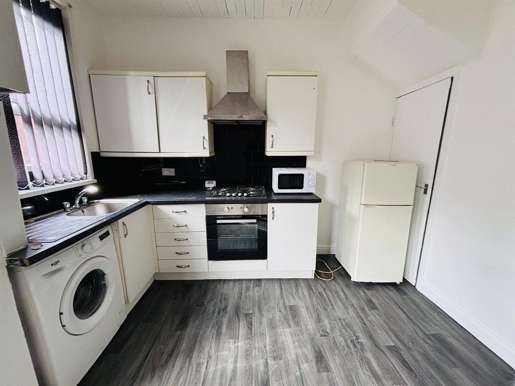Property photo 3 of 7 Fitted Kitchen Area: