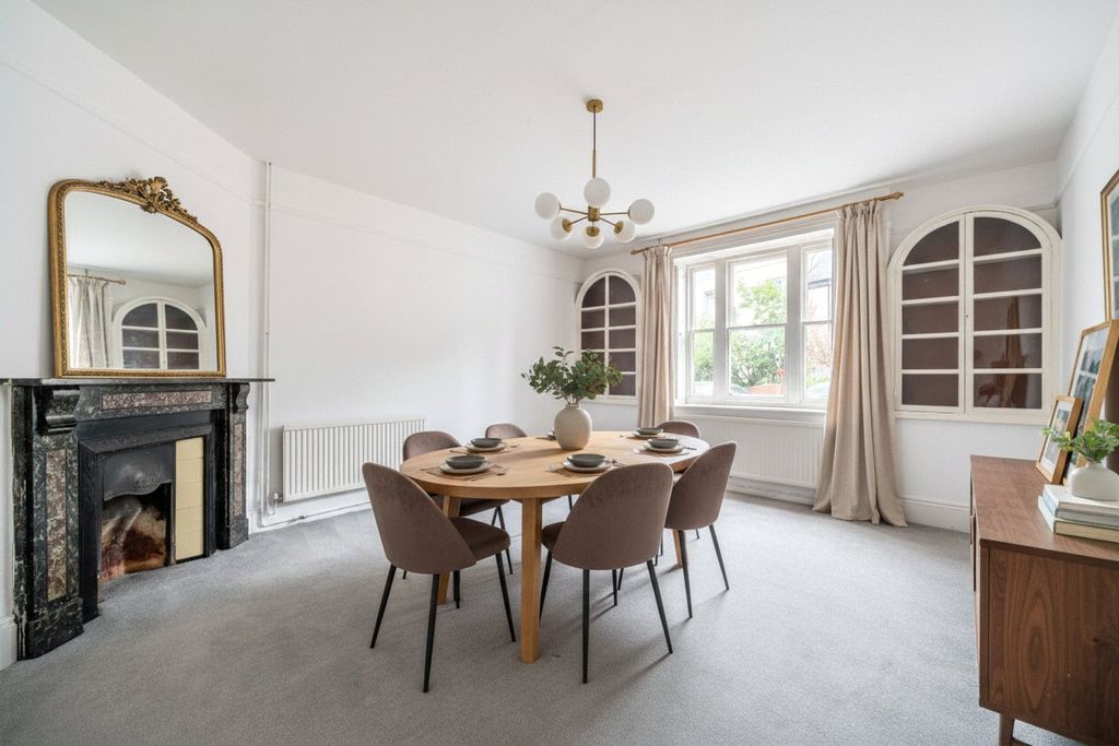 Property photo 3 of 11 Staged Dining Room