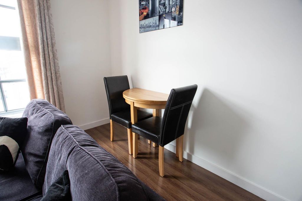 Property photo 2 of 8 Living Room