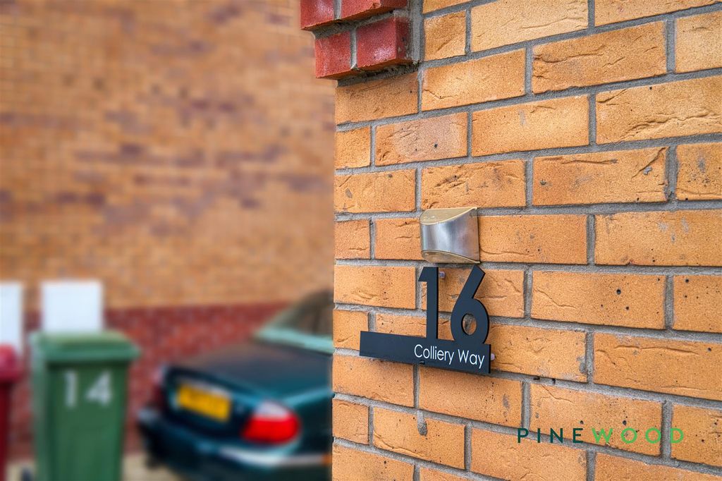 Property photo 3 of 20 Front