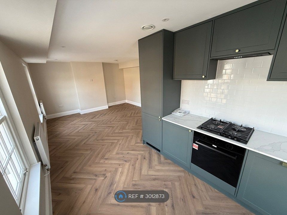 Property photo 1 of 7 Kitchen/Living Room