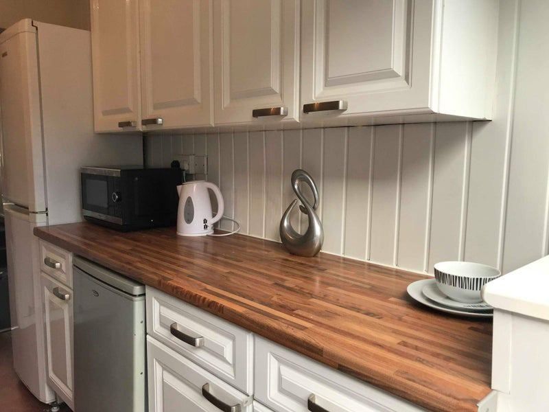 Property photo 1 of 5 A Well-Maintained Kitchen Featuring A Spacious Woo...