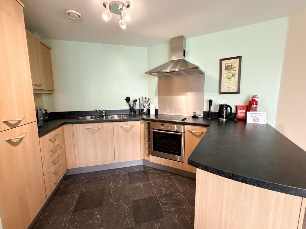 Property photo 2 of 12 Kitchen