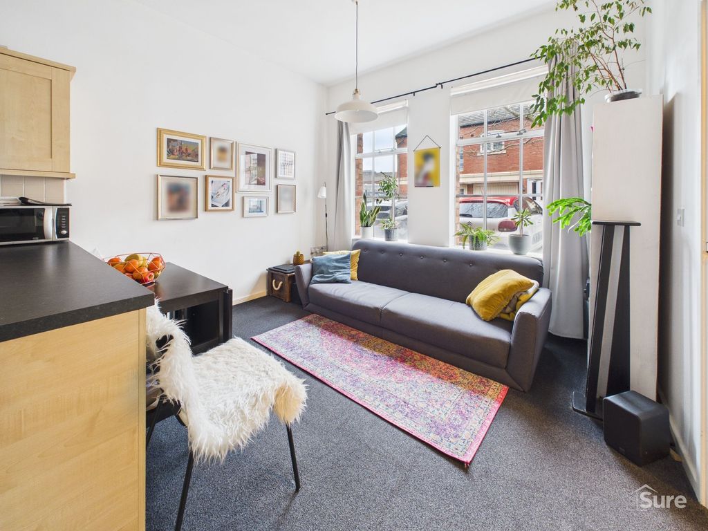 Property photo 2 of 8 Living Area