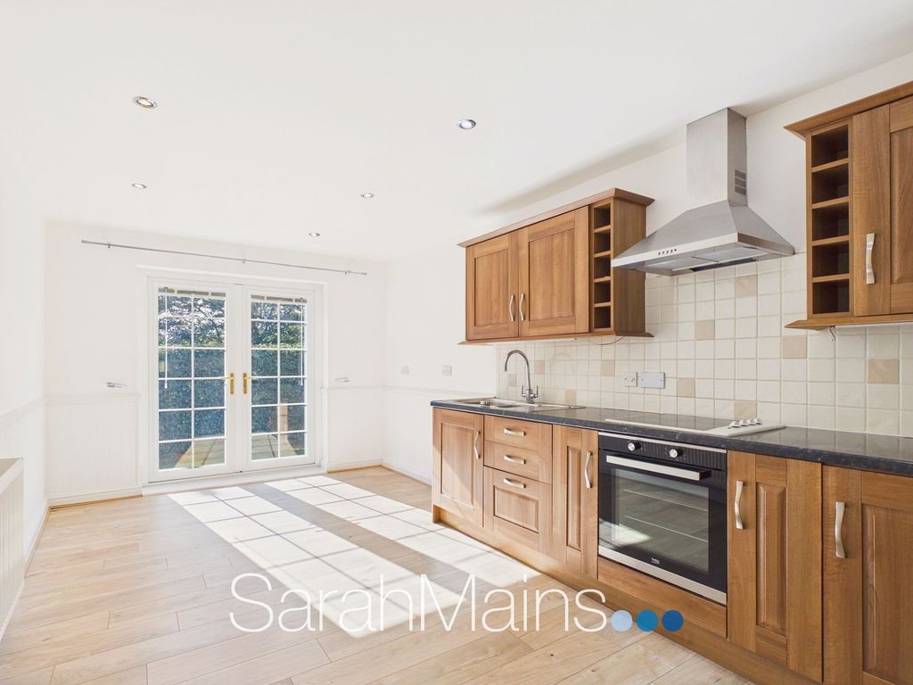 Property photo 3 of 13 Dining Kitchen