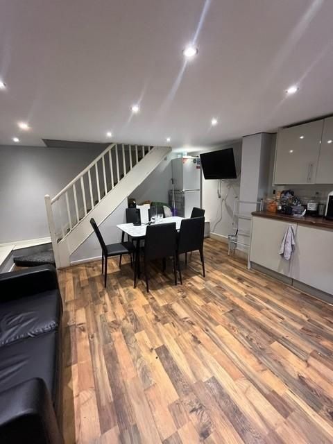 Property photo 1 of 14 Modern Open-Plan Living And Kitchen Area With Wood...