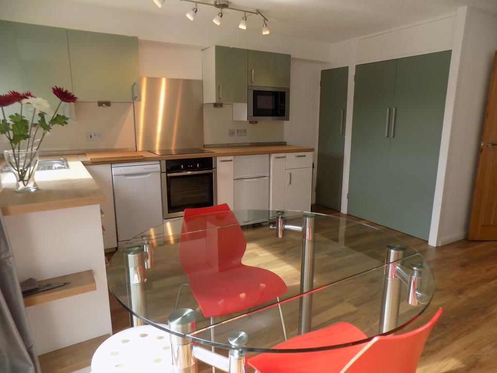 Property photo 3 of 8 Dining/Kitchen