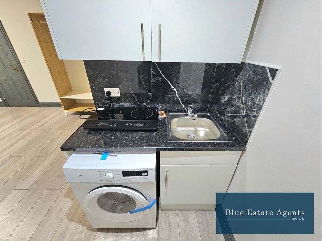 Property photo 3 of 4 Kitchen Area