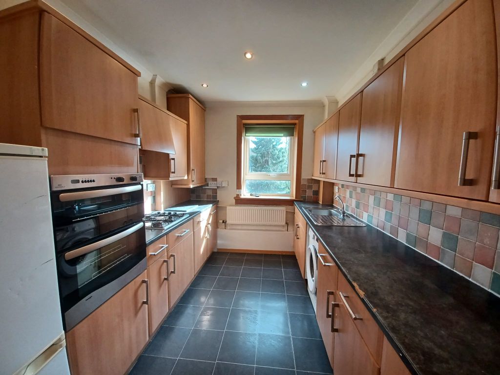 Property photo 3 of 10 Kitchen
