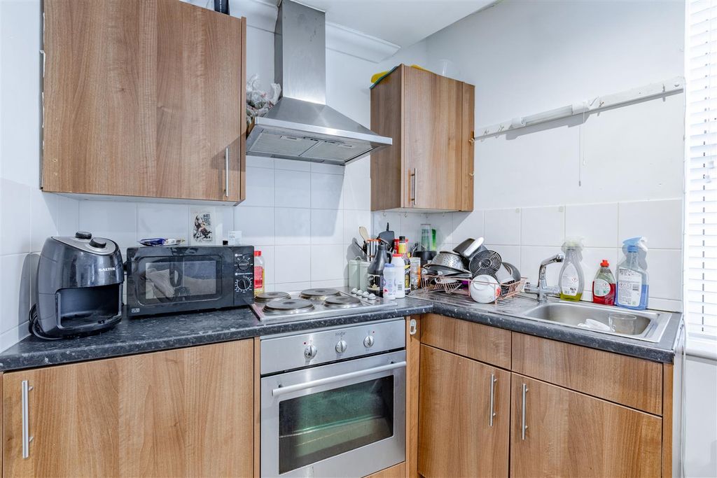 Property photo 2 of 4 Kitchen Area