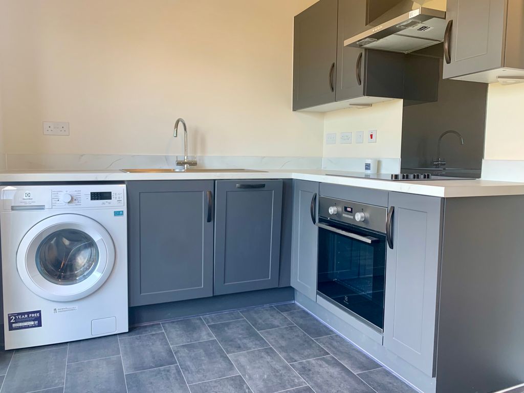 Property photo 3 of 9 Kitchen