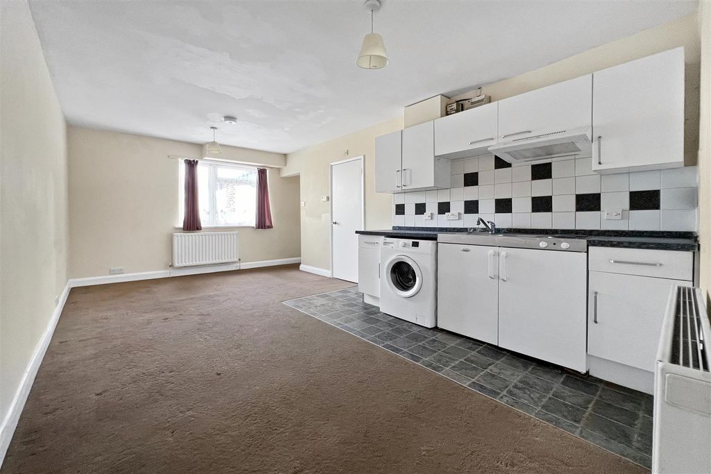Property photo 3 of 7 Kitchen Area
