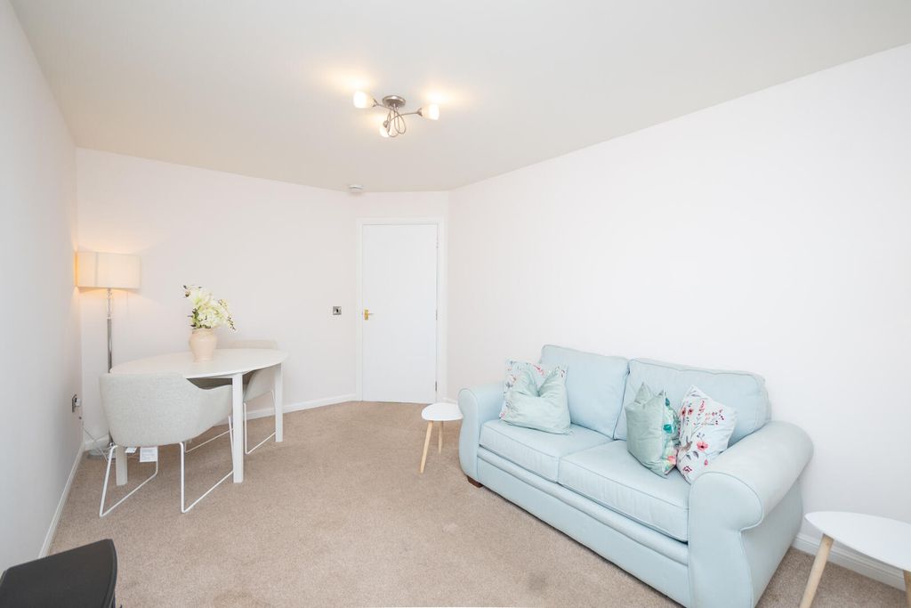 Property photo 3 of 12 Living Room