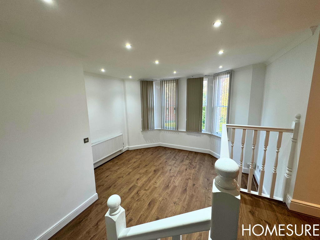 Property photo 2 of 12 Living Room