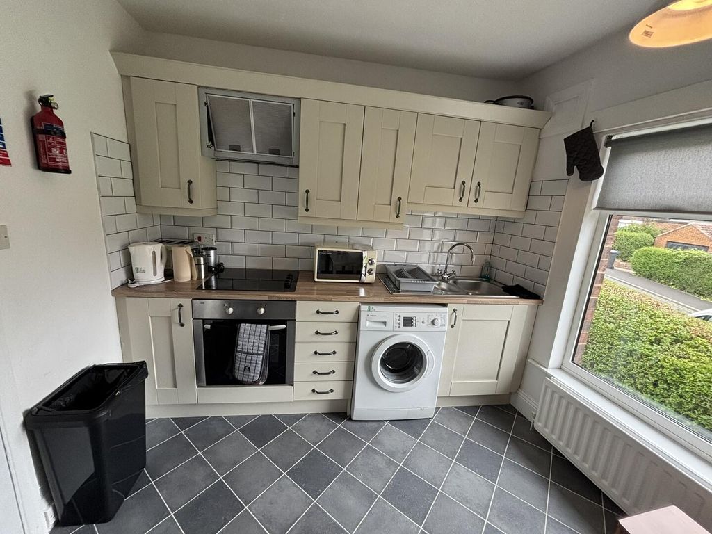 Property photo 3 of 13 Kitchen