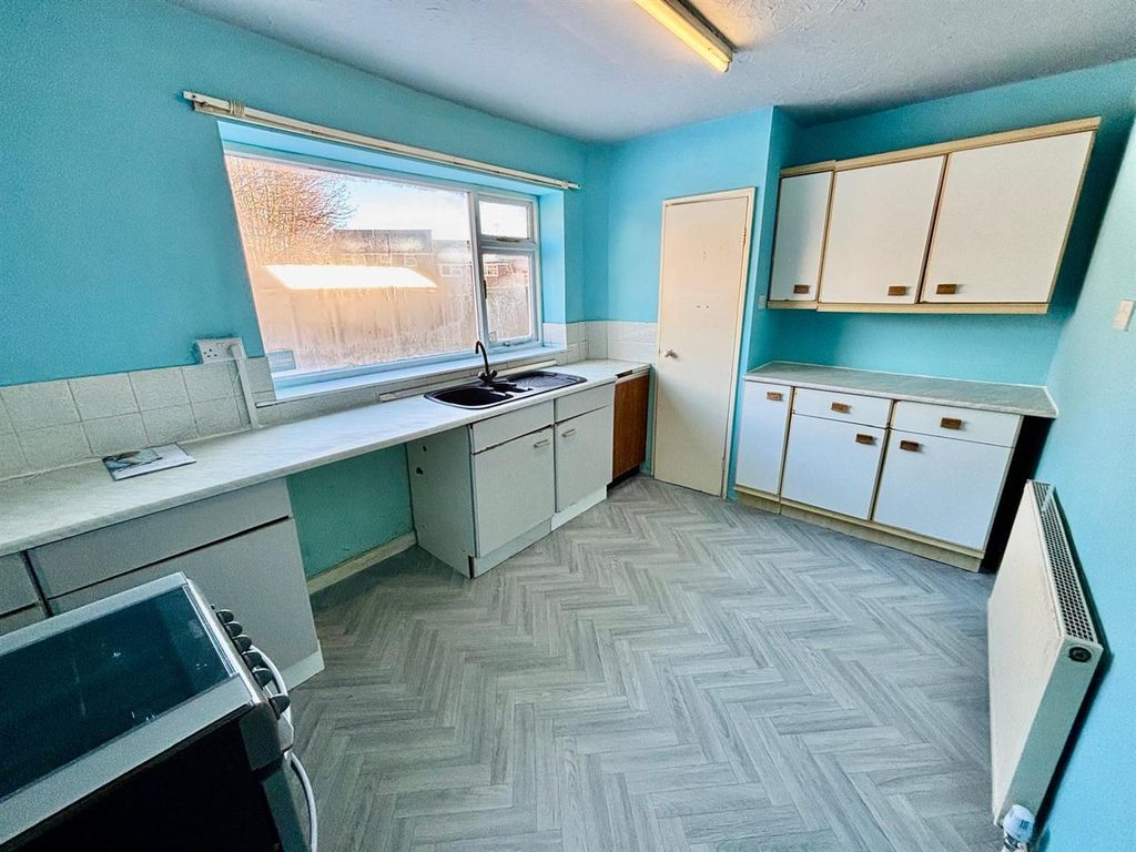 Property photo 3 of 12 Dining Kitchen: