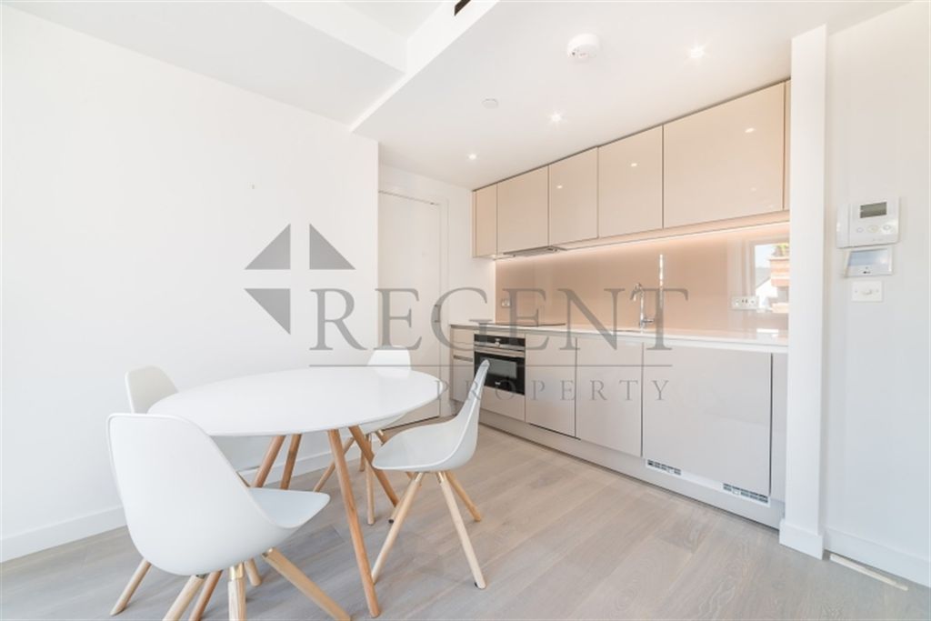 Property photo 2 of 7 Dining Room To Kitchen View