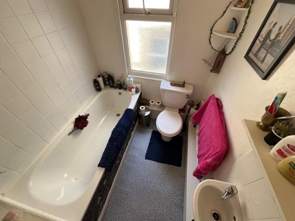 Property photo 2 of 12 A Tidy Bathroom Featuring A Bath And Modern Fixtur...