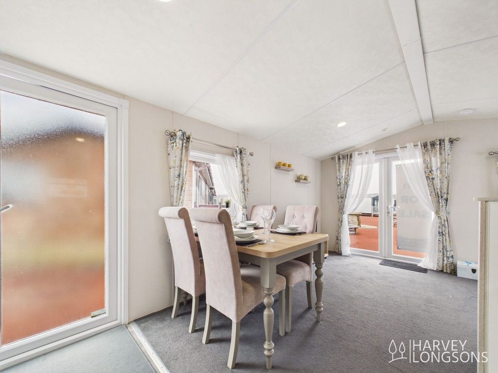 Property photo 3 of 16 Delta Saffron Dining Area Amble Links Holiday Park