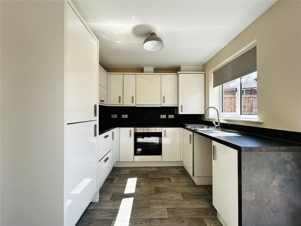 Property photo 3 of 16 Kitchen