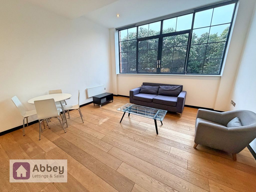 Property photo 3 of 13 Lounge/Dining Area