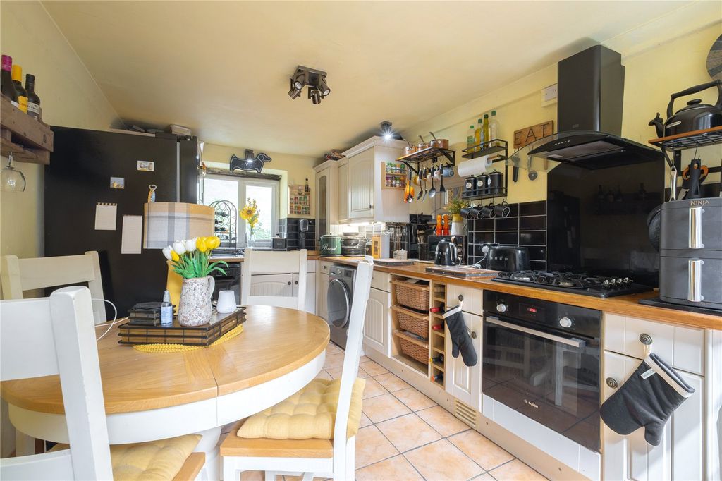 Property photo 3 of 16 Dining Kitchen