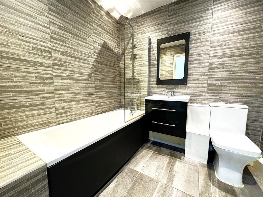Property photo 3 of 7 Modern Bathroom With Stylish Tiles And Bathtub...