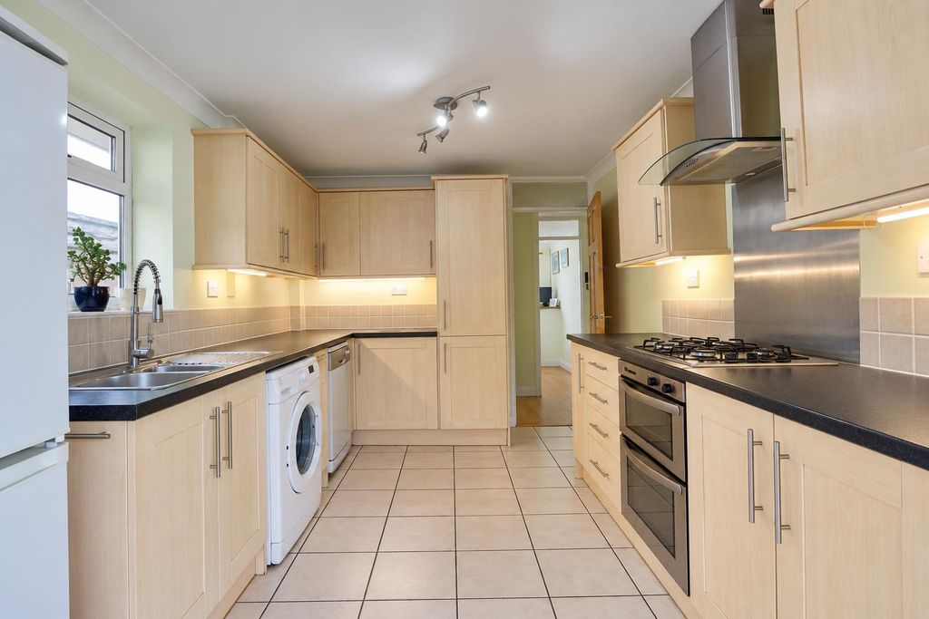 Property photo 3 of 12 Tidy Modern Galley Kitchen.Png