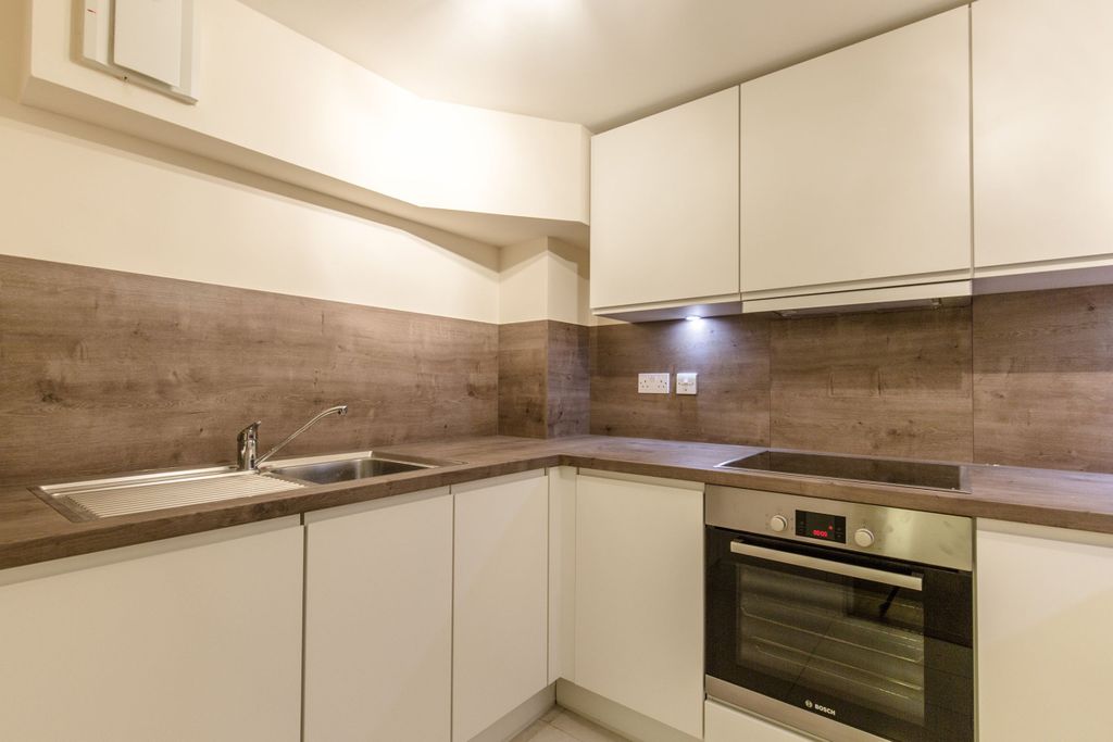 Property photo 1 of 12 Kitchen