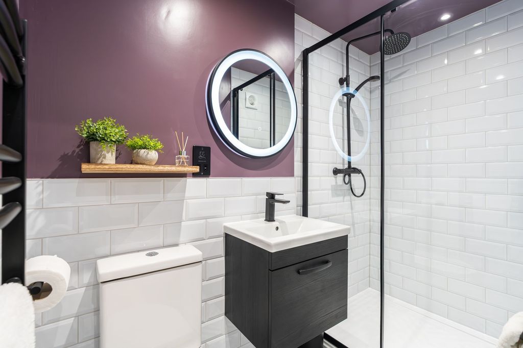 Property photo 2 of 14 A Modern Bathroom Suite Featuring A Sleek Black An...