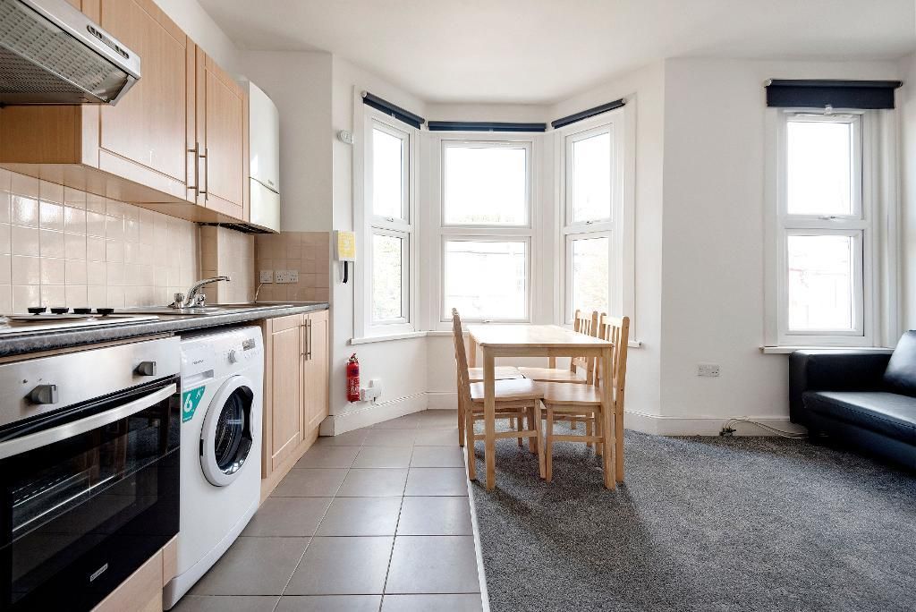 Property photo 3 of 13 Kitchen And Dining Area