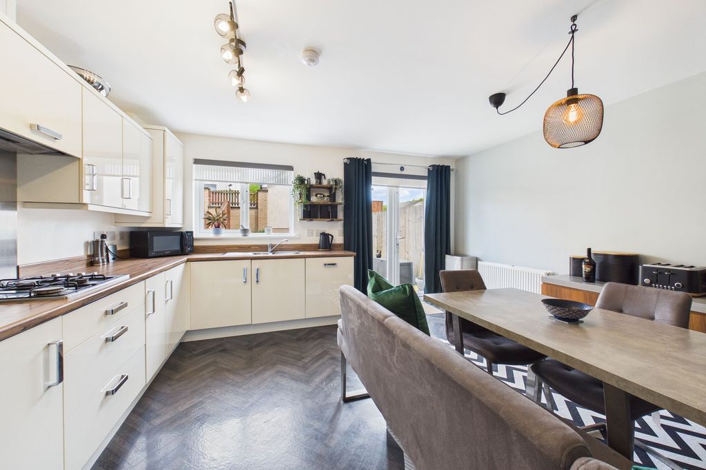 Property photo 3 of 18 Kitchen/Dining Angle 1