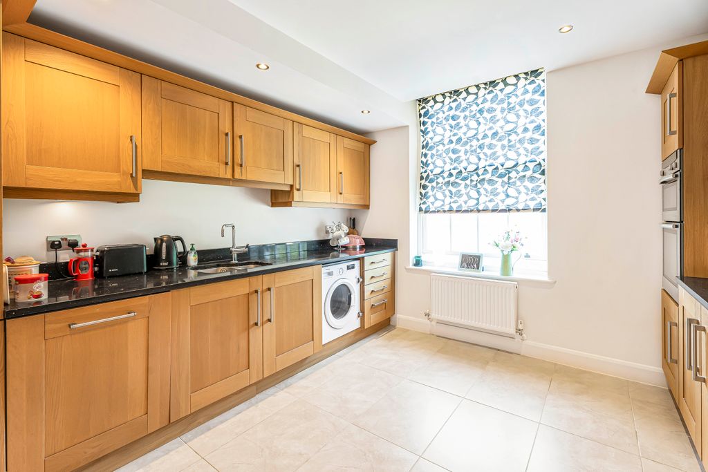 Property photo 3 of 12 Kitchen