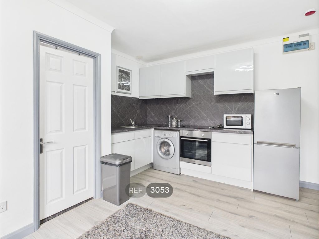 Property photo 1 of 10 Kitchen/Living Area