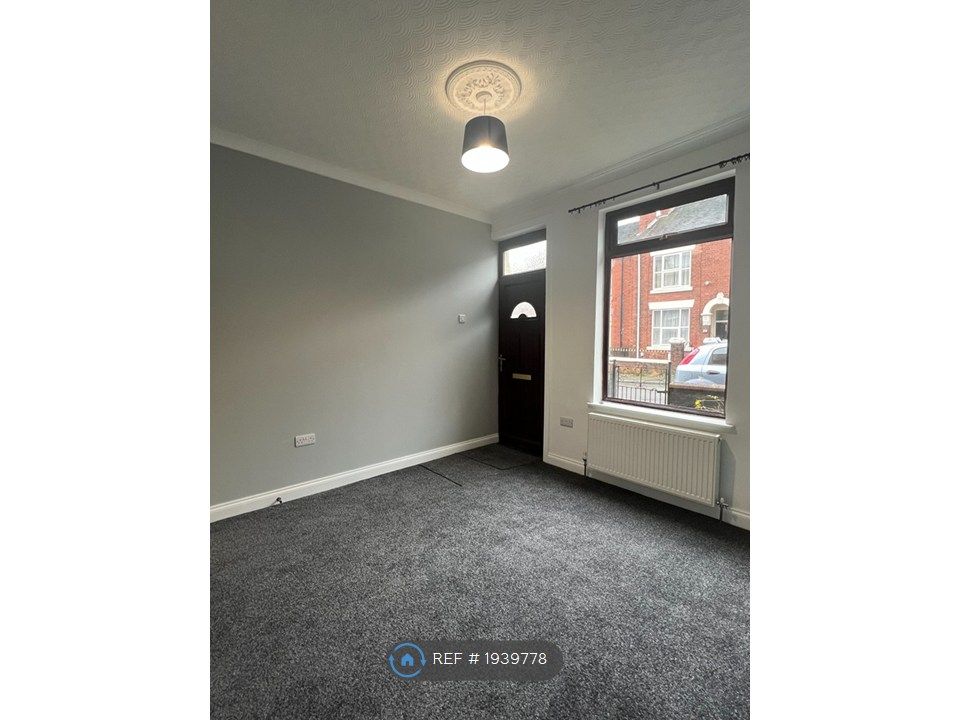 Property photo 3 of 20 Front Living Room 3