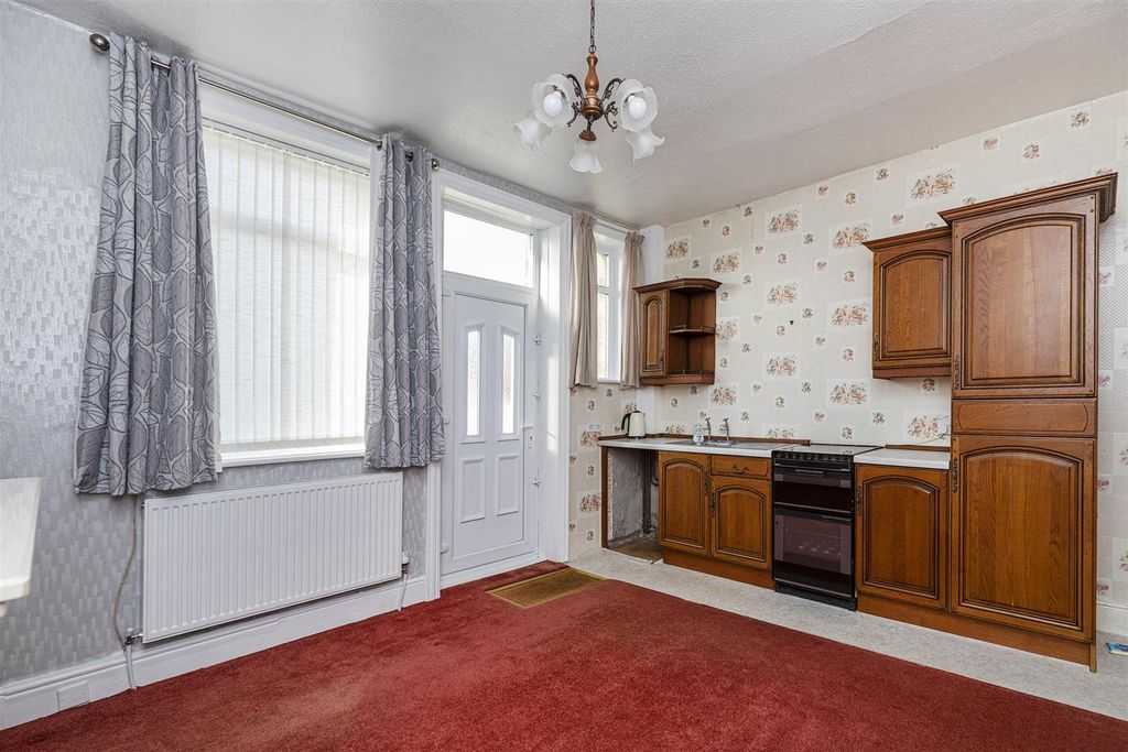 Property photo 2 of 17 Dining Kitchen