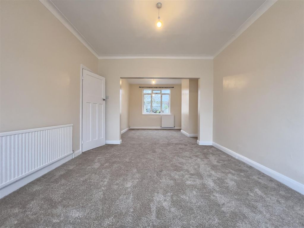 Property photo 2 of 9 Living Area