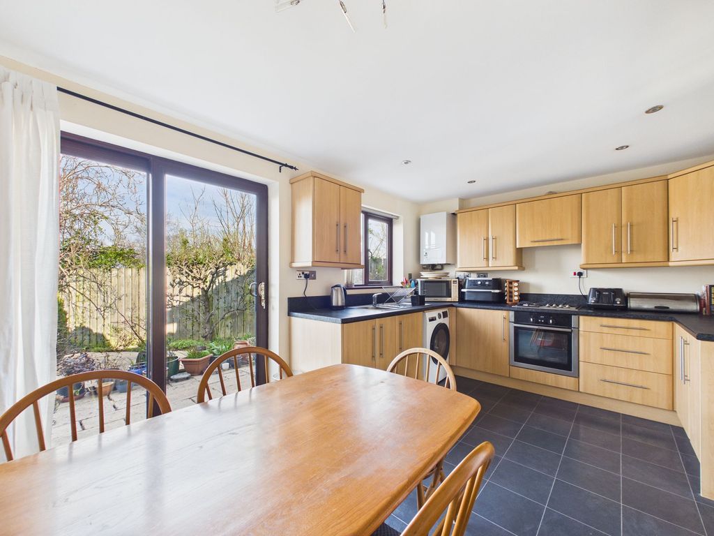 Property photo 3 of 17 Dining Kitchen