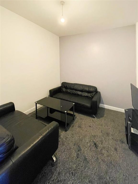 Property photo 3 of 13 Downstairs Living Ro