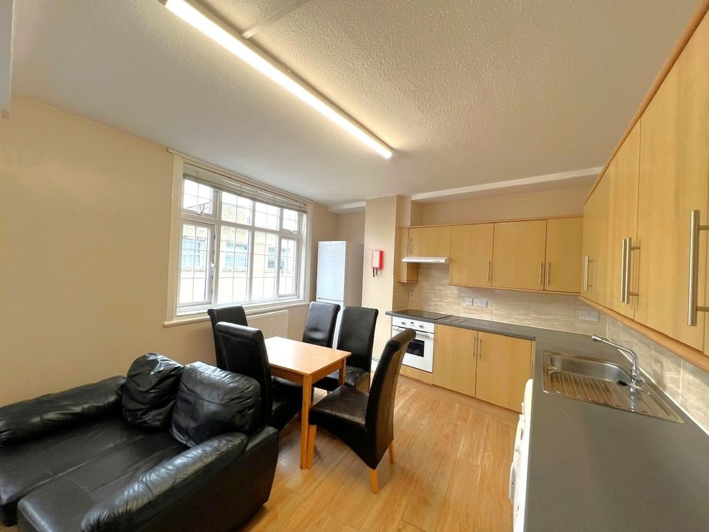 Property photo 2 of 11 Bright And Welcoming Kitchen With Ample Natural li...