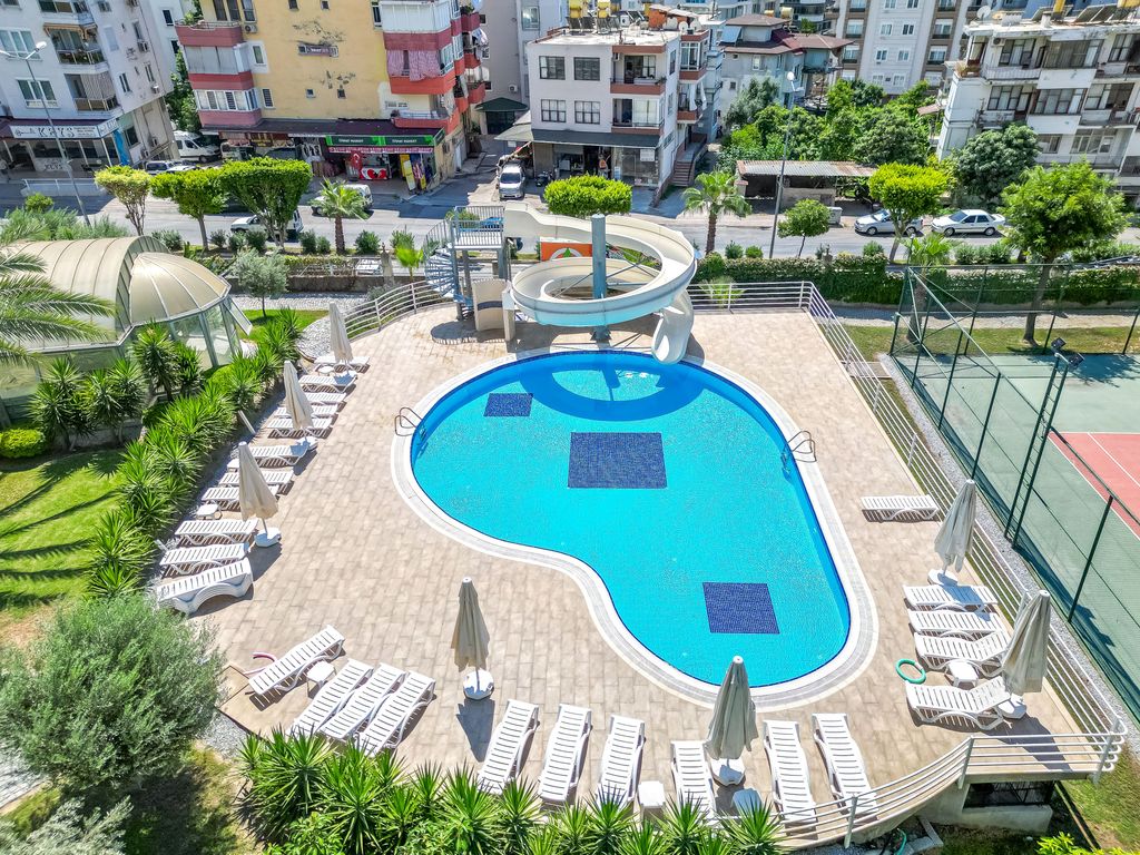 Property photo 2 of 25 Impressive Sea View Apartment In Cikcilli, Alanya For Sale - Shared Outdoor Pool