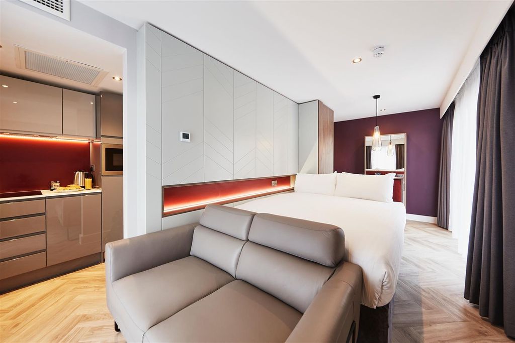 Property photo 1 of 5 Elegant Studio With Sleek Kitchen And Sofa...