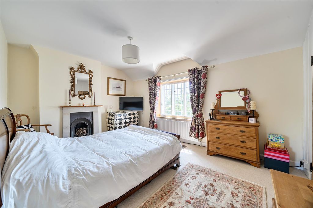 Property photo 3 of 16 Bedroom 1 With Decorative Fireplace