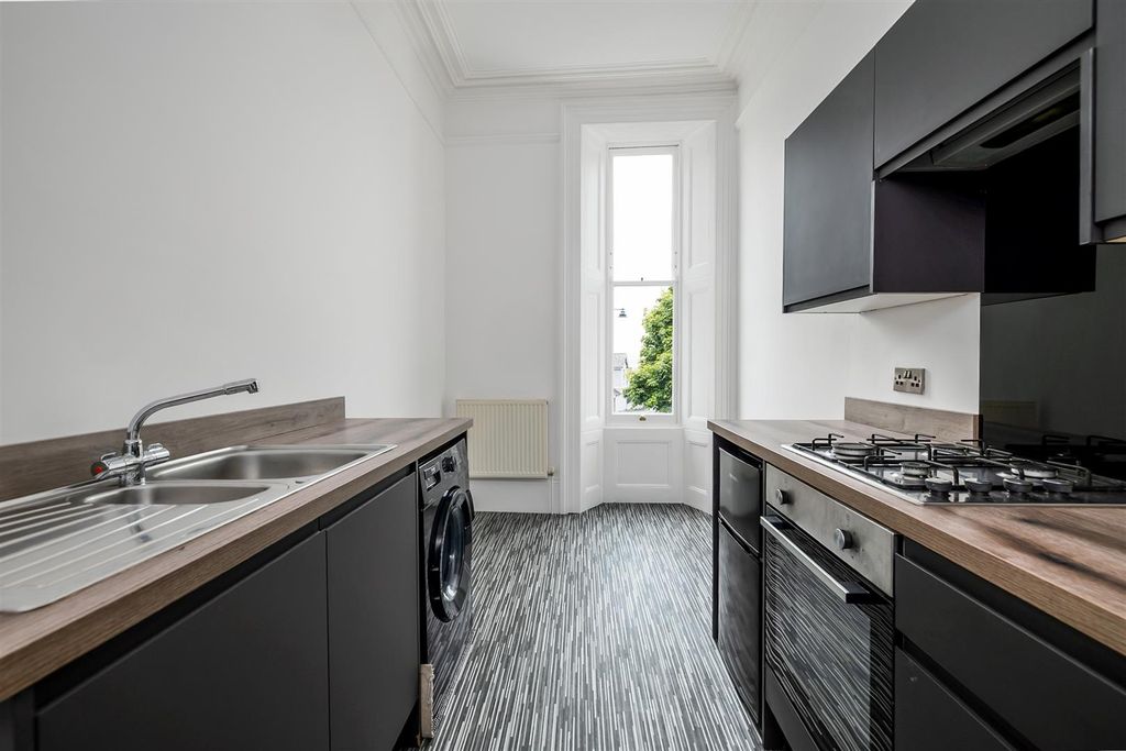 Property photo 3 of 12 Kitchen