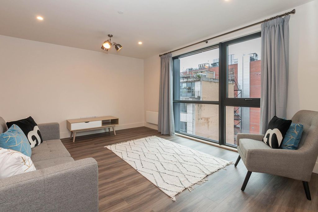 Property photo 2 of 15 Living Area